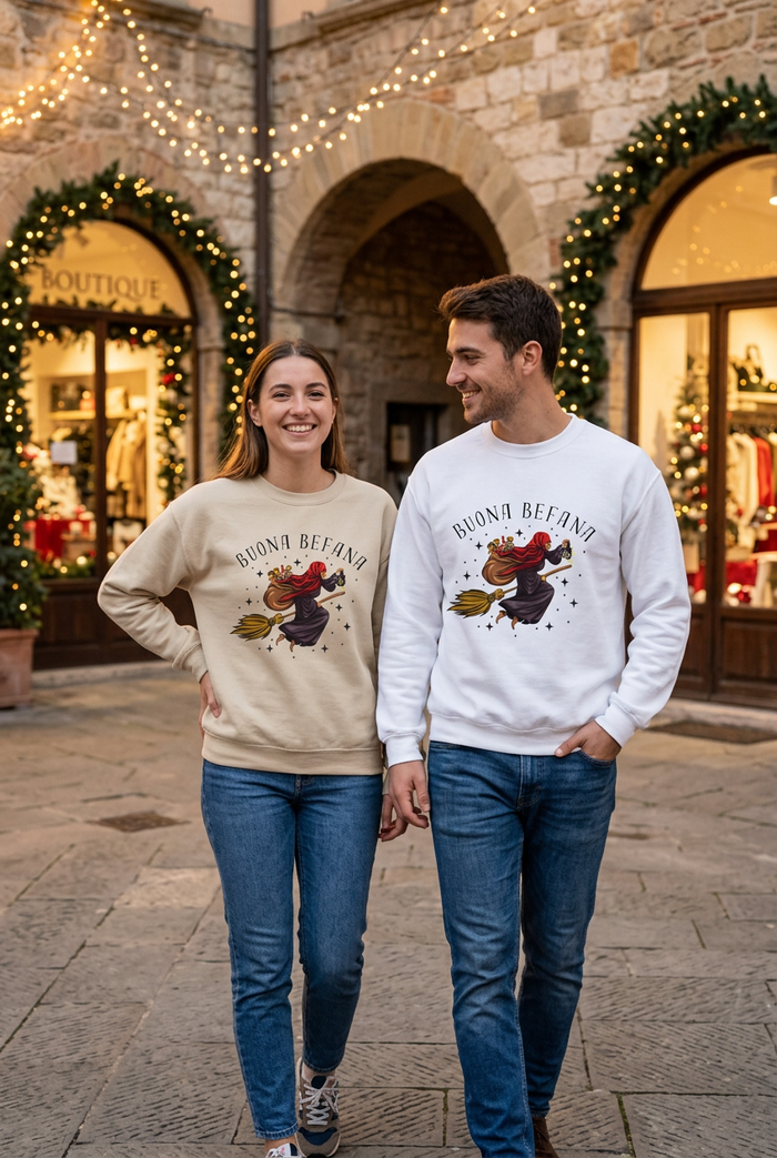 Couple outdoors wearing the Sand and White Buona Befana sweatshirts
