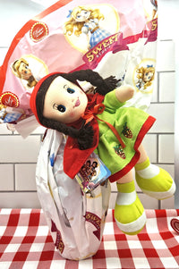 Milk Chocolate Easter Egg with a Sweet Doll