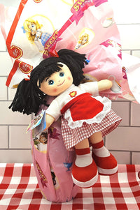 Milk Chocolate Easter Egg with a Sweet Doll