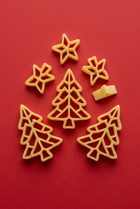 Holiday pasta on a festive red background