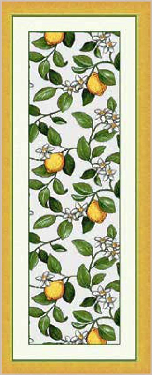 A fabric table runner with a floral pattern featuring lemons and green leaves, with a yellow border.