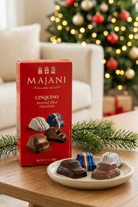 Majani Cinquino box and chocolates on a festive Christmas living-room table