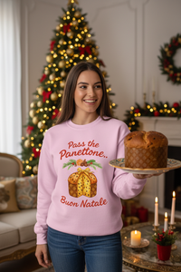 A woman in a pink crewneck sweatshirt with a 'Pass the Panettone.