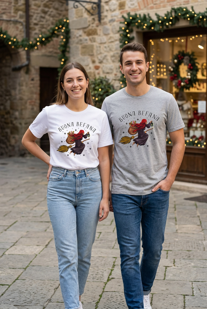Young couple outdoors wearing the white and gray Buona Befana tees