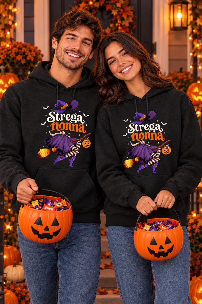 Young couple wearing the Strega Nonna Halloween hoodies on a decorated porch