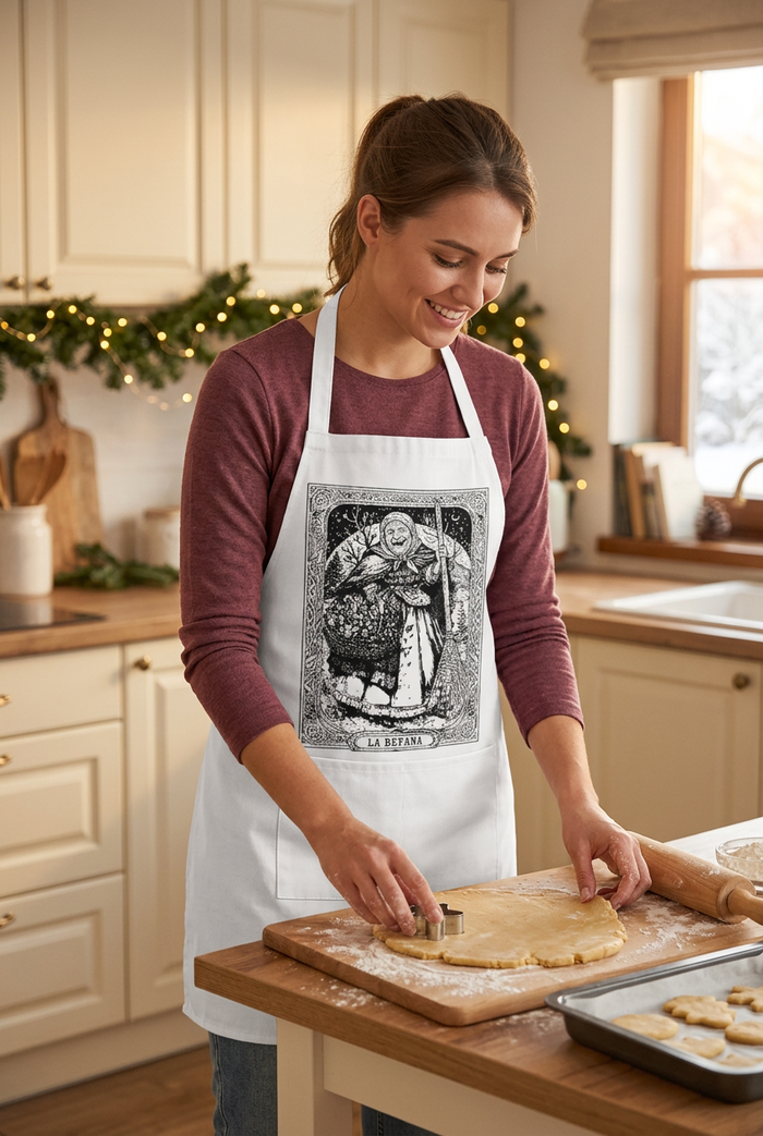 Young woman baking cookies in the Befana Storybook apron