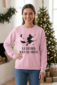 Young woman in the pink Befana sweatshirt with a relaxed hand-on-hip pose
